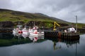 The N1 petrol station in Puffin Marina, Iceland with small white ships at the dock Royalty Free Stock Photo