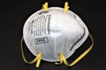 N95 Respirator safety gear on black, Top view Royalty Free Stock Photo