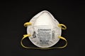 N95 Respirator safety gear on black Royalty Free Stock Photo