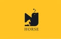 N yellow black horse alphabet letter logo icon with stallion shape inside. Creative design for business and company Royalty Free Stock Photo