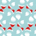 Santa Claus with red hat and white beard seamless texture pattern, Merry Christmas blue background Royalty Free Stock Photo