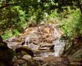 Na Muang Waterfall Koh Samui Island Thailand, Namuang Waterfall, falling water stream, mountain rocks landscape, tropical jungle Royalty Free Stock Photo