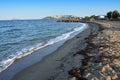 Seaside beach with washed algae near the town of Turgutreies in Turkey Royalty Free Stock Photo