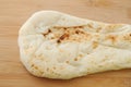 Naan indian bread  on cutting board Royalty Free Stock Photo