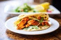 naan sandwich with tandoori chicken and fresh lettuce Royalty Free Stock Photo