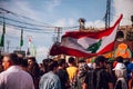 Protesters Rising Lebanese Flag in the Sky during Lebanon Civil Protests