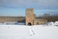 Nabatnaya Alarm tower of Ivangorod fortress, cloudy March morning. Russia