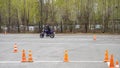 Naberezhnye Chelny, Russia - April 25, 2023: Young people learn to ride a motorbike in a motor school