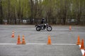 Naberezhnye Chelny, Russia - April 25, 2023: Young people learn to ride a motorbike in a motor school