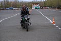 Naberezhnye Chelny, Russia - April 25, 2023: Young people learn to ride a motorbike in a motor school