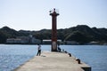 Locals fishing at Nachikatsuura Port during a sunny day. Royalty Free Stock Photo