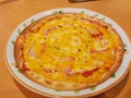 Nacho Bacon and ham pizza on plate dish Royalty Free Stock Photo