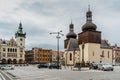 Nachod,Czech Republic- May 23,2021. City centre with Masaryk square,New Town Hall and medieval St. Lawrence`s Church with two bel