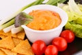 Nachos, cheese sauce, vegetables Royalty Free Stock Photo