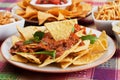 Nachos, corn chips with chili sauce