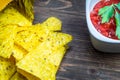 Nachos corn chips with classic tomato salsa. Fresh cold beer is perfect with savory snacks. Royalty Free Stock Photo