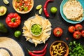 Nachos with guacamole, beans, salsa and tortillas. Mexican food