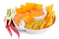 Nachos, guacamole and cheese sauce, vegetables