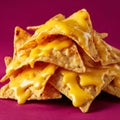 Nachos with melted cheese on vibrant magenta background. Royalty Free Stock Photo