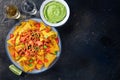 Nachos, Mexican food, tortilla chips with beef and fresh vegetables Royalty Free Stock Photo