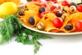 Nachos, olives, pork loin and vegetables Royalty Free Stock Photo