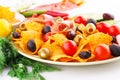 Nachos, olives, pork loin and vegetables Royalty Free Stock Photo