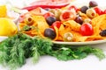 Nachos, olives, pork loin and vegetables Royalty Free Stock Photo