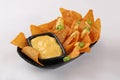 Nachos tortilla chips with sauce and jalapenos isolate white background Royalty Free Stock Photo