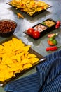 Nachos with Tortilla chips tomato salsa, bean and mustard on rustic stone background.A textured background.Copy paste place Royalty Free Stock Photo