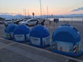 Nafplio, Greece, July 13th 2018: Big containers for collecting glass packaging