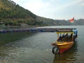 yellow boat at lake toba