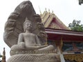 Naga Buddha statue in front of the pavilion