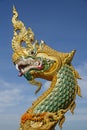 naga head statue in Thakhek Laos