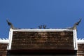 Naga on Laos temple roof Royalty Free Stock Photo