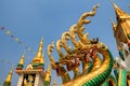 Naga sculpture against blue sky