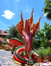 The Naga statue is a legendary animal in a colorful Thai temple.