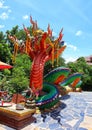 The Naga statue is a legendary animal in a colorful Thai temple.