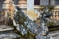 Naga statues adorn the stairs of an ancient church in Wat Luang Pakse