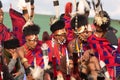 Naga Tribesmen siting dressed in traditional warrior attire