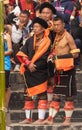 Naga tribesmen wearing their traditional attire and standing together