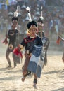 NAGALAND, INDIA, December 2013, Naga Warrior performing games during Hornbill Festival Royalty Free Stock Photo