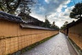 Nagamashi district or samurai district street with dramatic sky showing the earthen walls covered with straw mats, Kanazawa, Japan Royalty Free Stock Photo