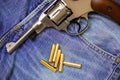 Nagan revolver with ammunition Royalty Free Stock Photo