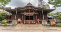 Suzu hanging bell, Ema votive plaques and Mizugame (Water Jug) at Yohashira Shrine, Shinto srines devoted to Zouka Sanshin deities