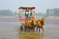 NAGAON BEACH, MAHARASHTRA, INDIA 13 JAN 2018. Tourists enjoy a horse cart ride