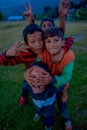 NAGARKOT, NEPAL OCTOBER 11, 2017: Unidentified group of playful little children playing and enjoying time with their