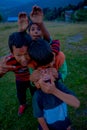 NAGARKOT, NEPAL OCTOBER 11, 2017: Unidentified group of playful little children playing and enjoying time with their