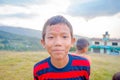 NAGARKOT, NEPAL OCTOBER 11, 2017: Unidentified playful little boy looking at camera in utdoors in Nagarkot Village