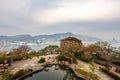 NAGASAKI, Japan, 03/11/19. Glover Garden pond, trees, flowers and a view point on the hill with Nagasaki Port, Japan.