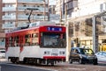 Nagasaki, Japan - 4 November 2020: Red and white tram in Nagasaki